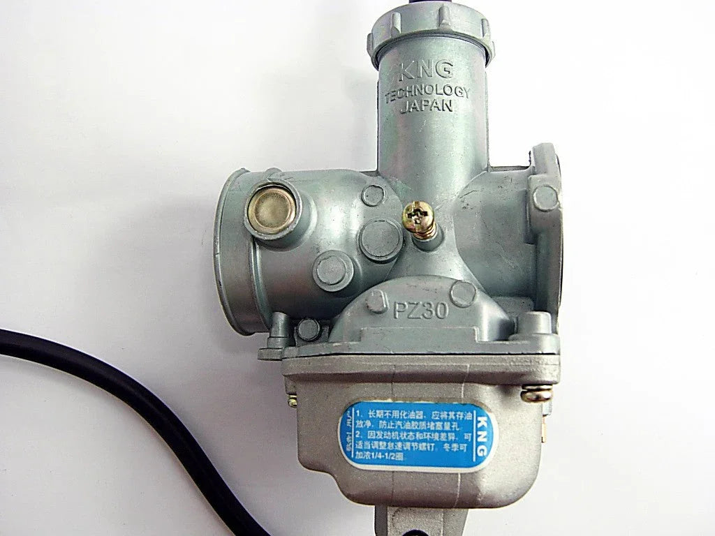Silver KNG Technology Japan PZ30 carburetor with blue label and black cable on white background