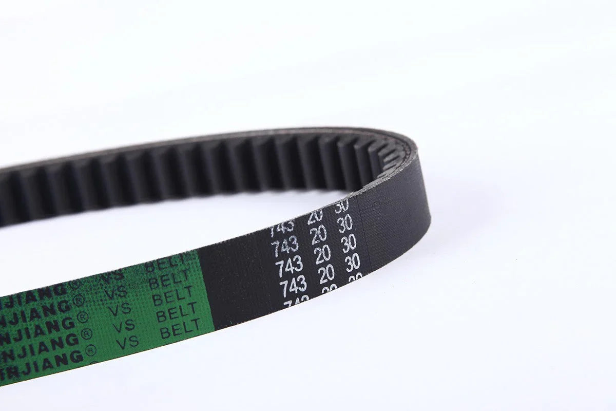 Toothed black and green timing belt with printed numbers and text on white background