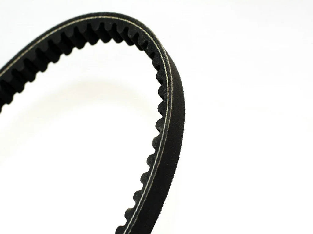 Close-up of black toothed timing belt on white background for automotive engine