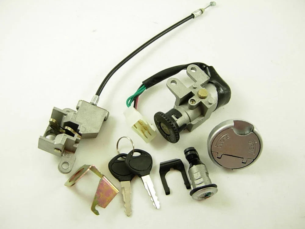 Motorcycle ignition switch kit with keys, lock cylinder, fuel cap, and mounting bracket on white background