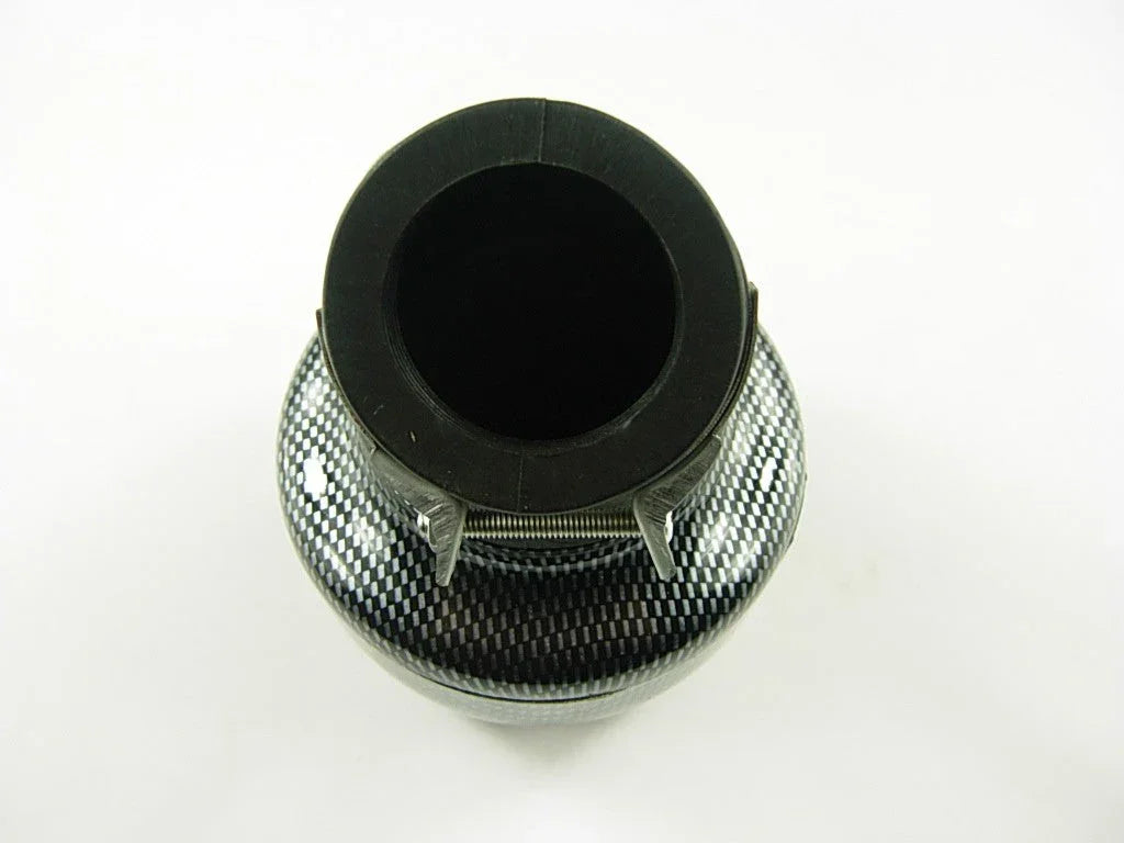 Top view of black carbon fiber car exhaust tip with metal clamp on white background