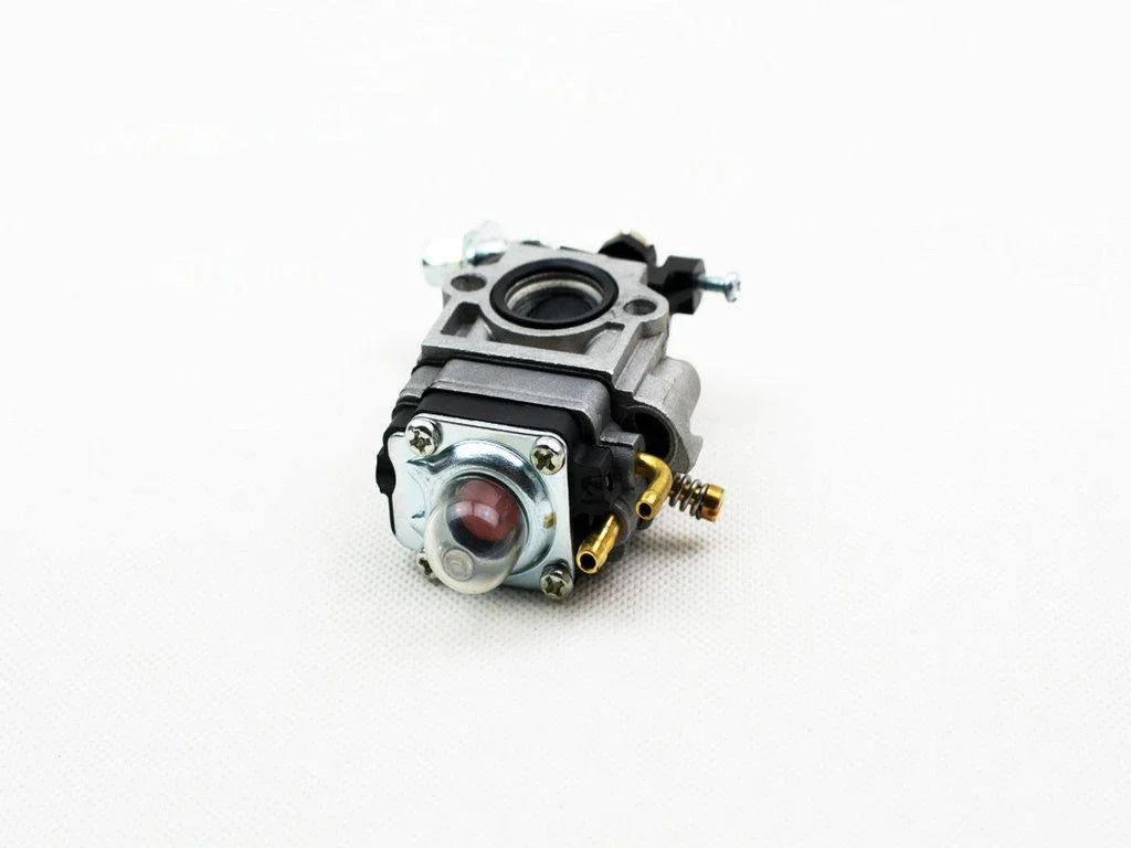 Small carburetor engine part with metal and plastic components on white background