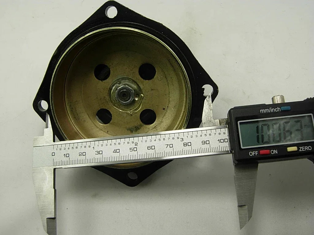 Motorcycle clutch bell measured at 100.67mm with digital caliper, compatible with dirt bikes and ATVs
