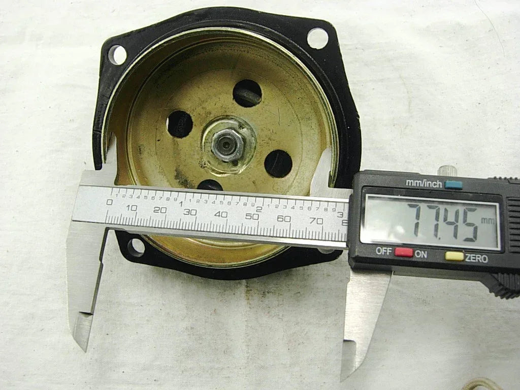 77.45mm clutch bell for dirt bike or ATV, measured with digital caliper, gold and black metal component