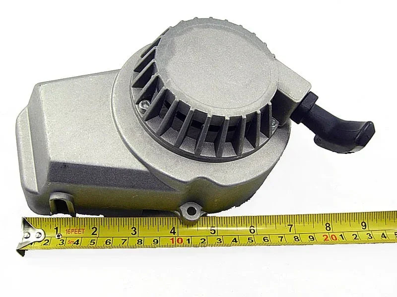 Silver 49cc engine for scooters, go-karts, ATVs with black pull start, measured with tape