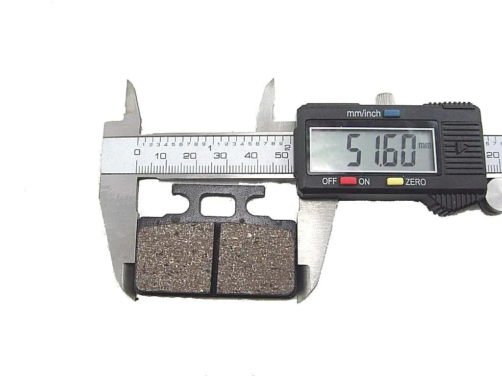 Chinese Parts USA brake pads for 125cc motor vehicles, showing the metal backing and friction surface in the image.