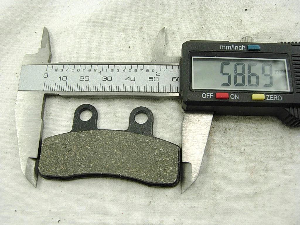 Chinese Parts USA 125cc dirt bike brake pads set with 58.69mm size, front brake pads for dirt bike maintenance and repair.