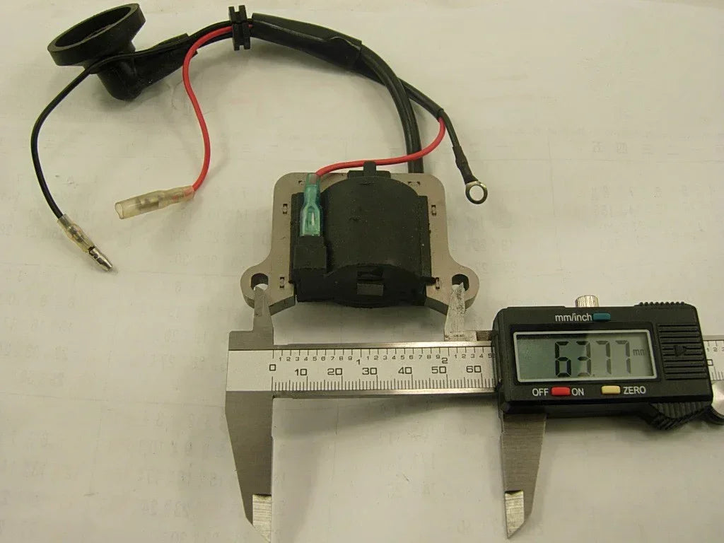 Ignition coil for 47cc and 49cc mini pocket bike by Chinese Parts USA, showcasing its compact design and durable construction.