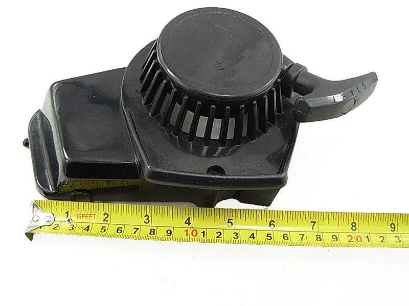 Black motorcycle engine air filter housing with measuring tape, compatible with dirt bikes, ATVs, and scooters