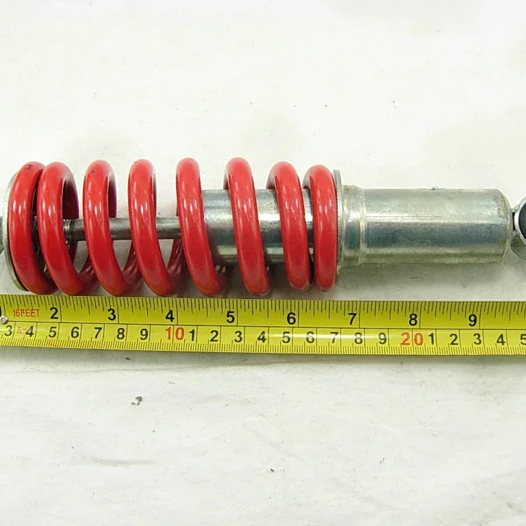 ChinesePartsUSA 10.2-inch rear shock absorber for dirt pit bikes and ATVs, durable suspension part for off-road riding.
