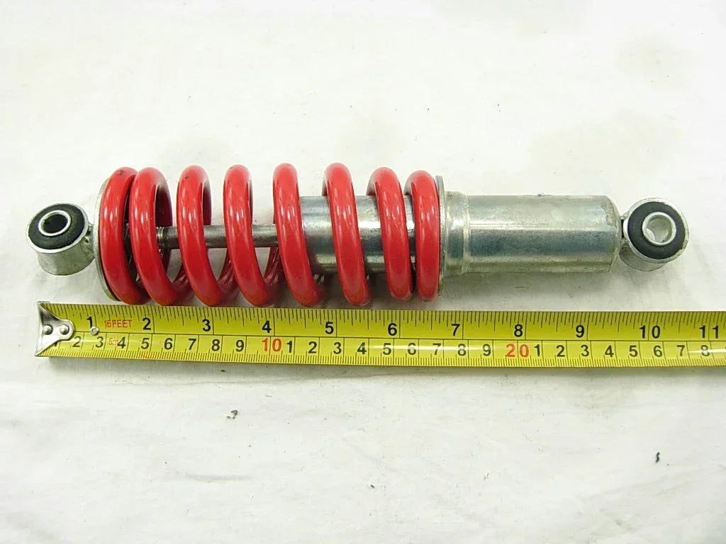 ChinesePartsUSA 10.2-inch rear shock absorber for dirt pit bikes and ATVs, durable suspension part for off-road riding.