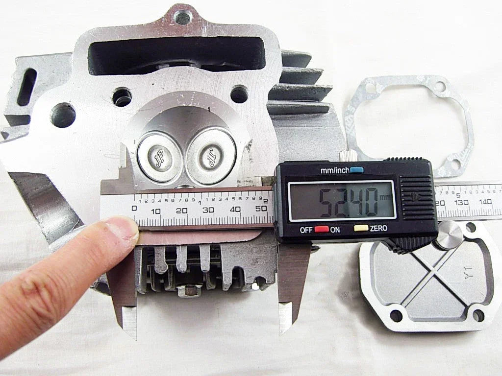 110cc engine cylinder head assembly for dirt bikes, ChinesePartsUSA brand, showing metal cylinder head with bolts and fins.
