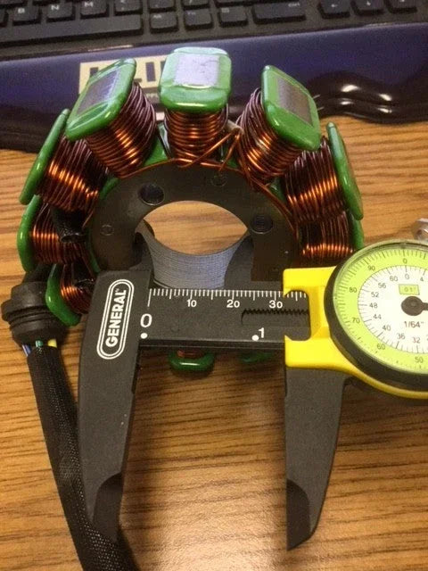 12 coils poles magneto stator for CG150, CG200, CG250cc dirt bikes, showing the stator with electrical coils and mounting points.