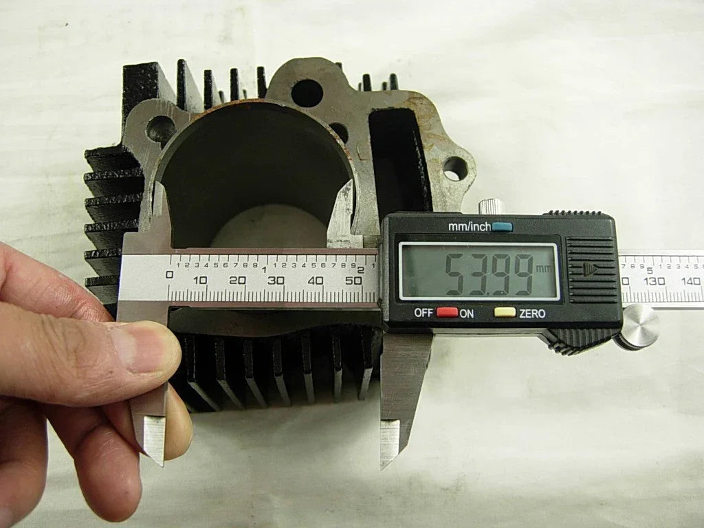 125cc E22 style engine cylinder body for dirt bikes, ChinesePartsUSA brand, shown with metal cylinder and mounting points.