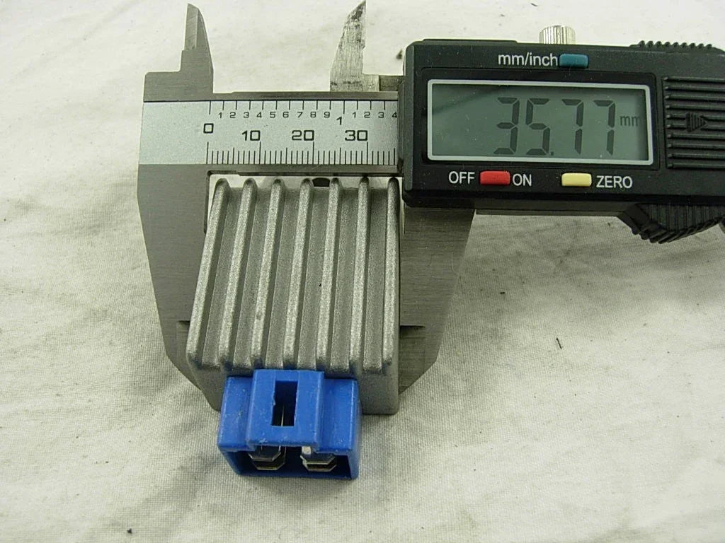 12V 4-pin rectifier regulator for 50cc to 125cc dirt bikes, compatible with ChinesePartsUSA models, shown on a dirt bike part.