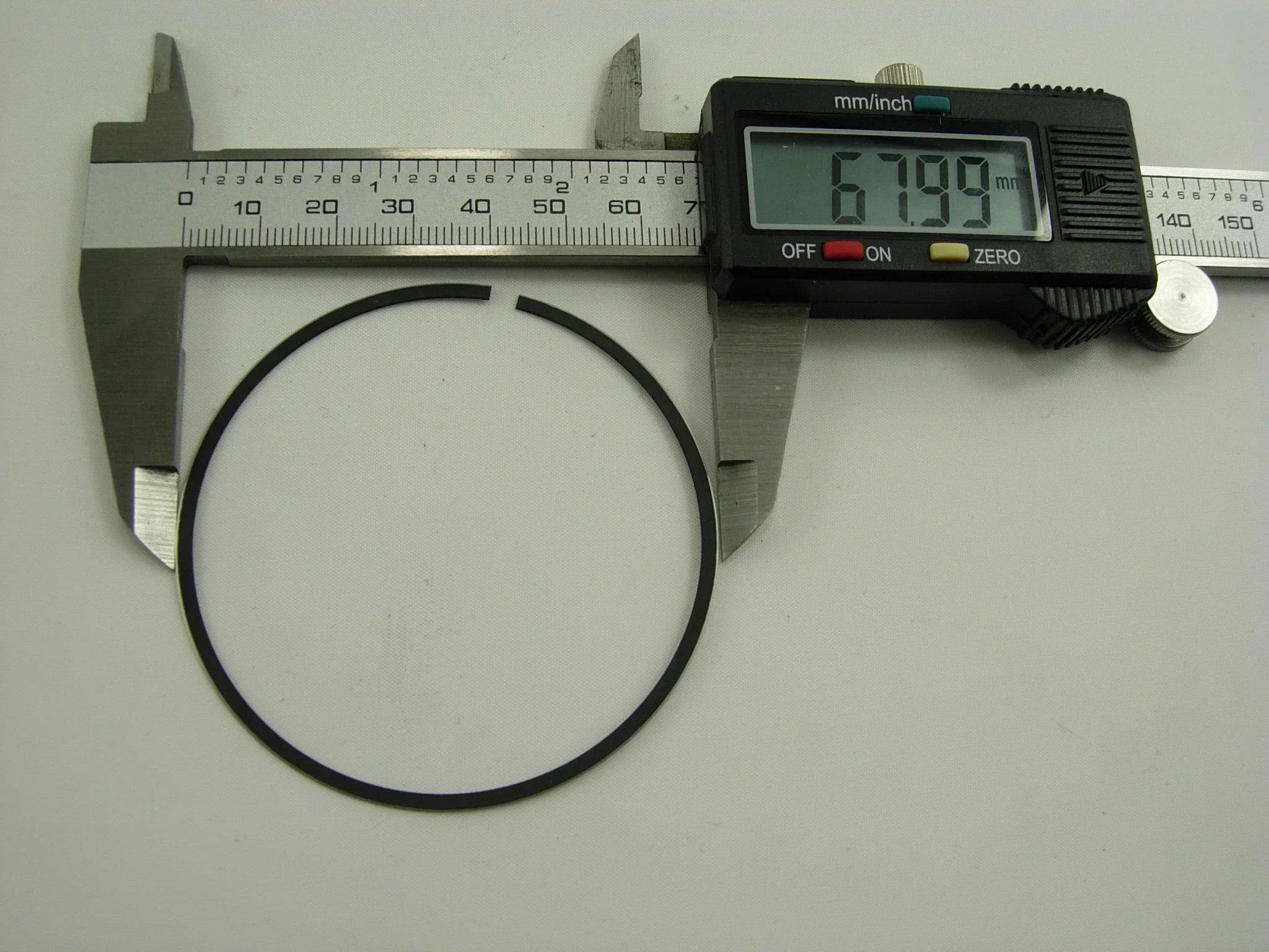 250cc CG engine piston ring set for dirt bikes from ChinesePartsUSA, showing close-up of the piston rings and engine components.