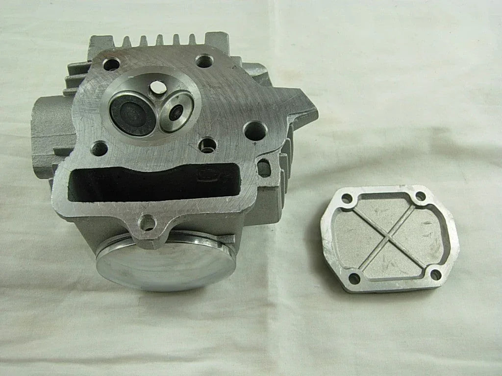ChinesePartsUSA 70cc/90cc E22 style dirt bike engine cylinder head assembly with cooling fins and mounting points.