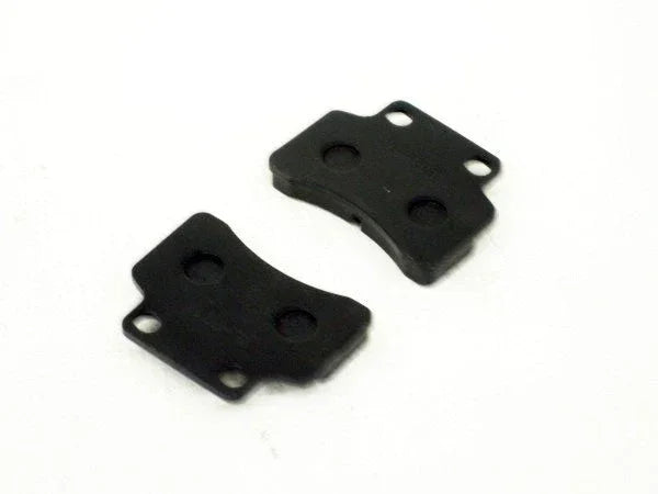 Brake pads set for 150cc dirt bike, ChinesePartsUSA brand, showing black rubber brake pads with metal backing plates.