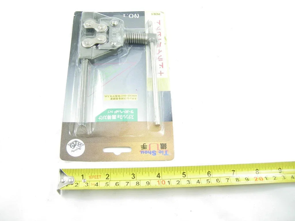 ChinesePartsUSA dirt bike chain rivet remover tool for chain repair and maintenance, shown with assembled parts and handles.