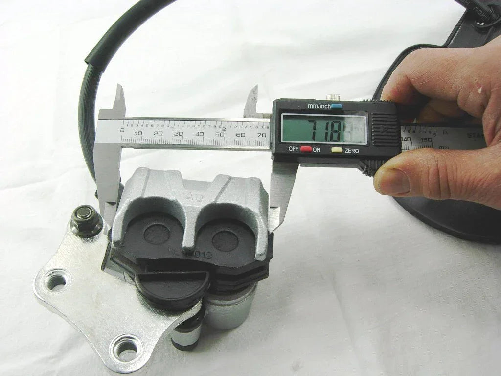Hydraulic brake caliper cylinder assembly for GY6 50cc scooters, compatible with ChinesePartsUSA motorcycle parts.