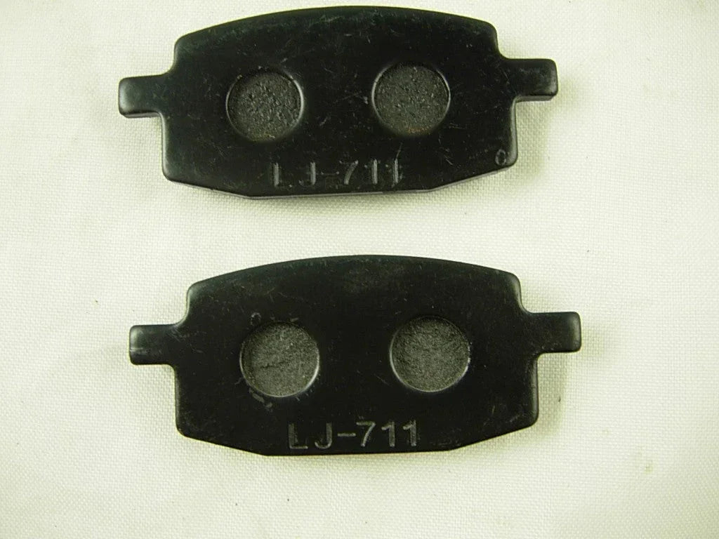 Set of brake pads for GY6 50cc scooters, manufactured by ChinesePartsUSA, in a close-up image showing the brake pad details.