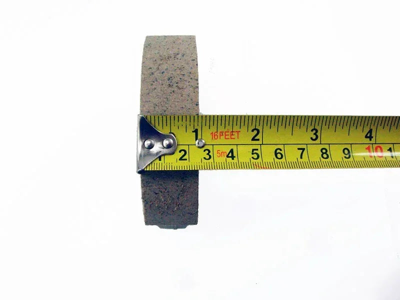 Brake shoe set for GY6 50cc scooter from ChinesePartsUSA, showing four brake shoes with metal components and wear surfaces.