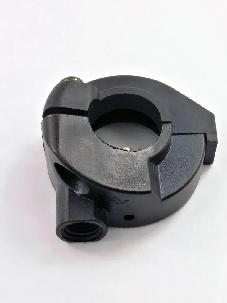 Black motorcycle handlebar clamp with threaded port for ATV, dirt bike, or scooter parts