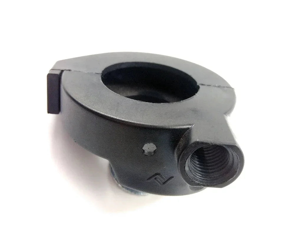 Black motorcycle handlebar clamp with threaded port for ATV, dirt bike, or scooter parts