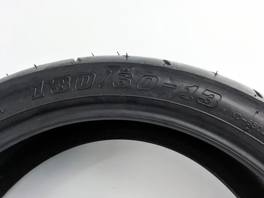 Tubeless 130/60-13 motorcycle scooter tire from ChinesePartsUSA, suitable for front or rear moped and scooter applications.