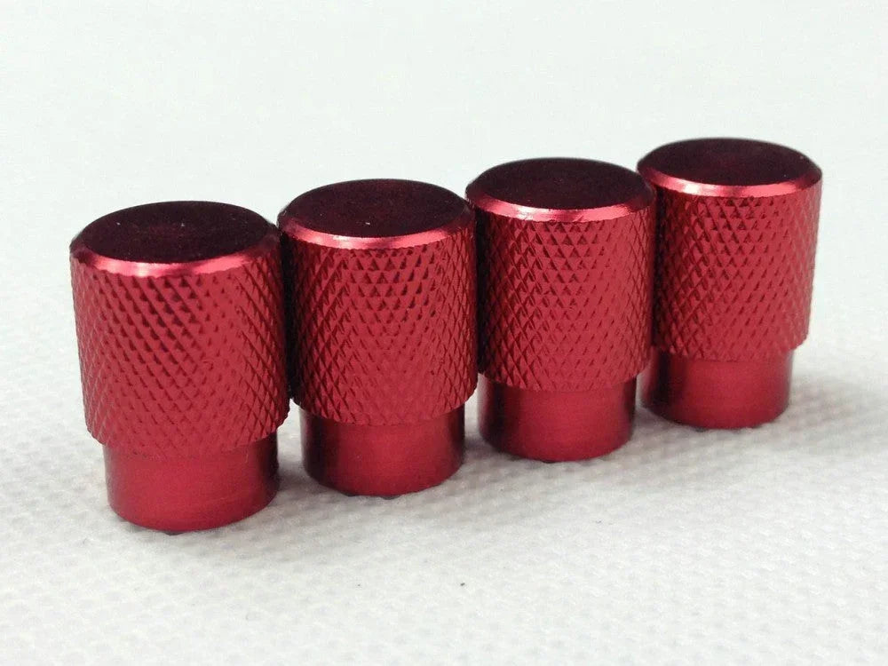 Set of four red tire air valve stem caps for racing sport wheels, universal accessory by ChinesePartsUSA.