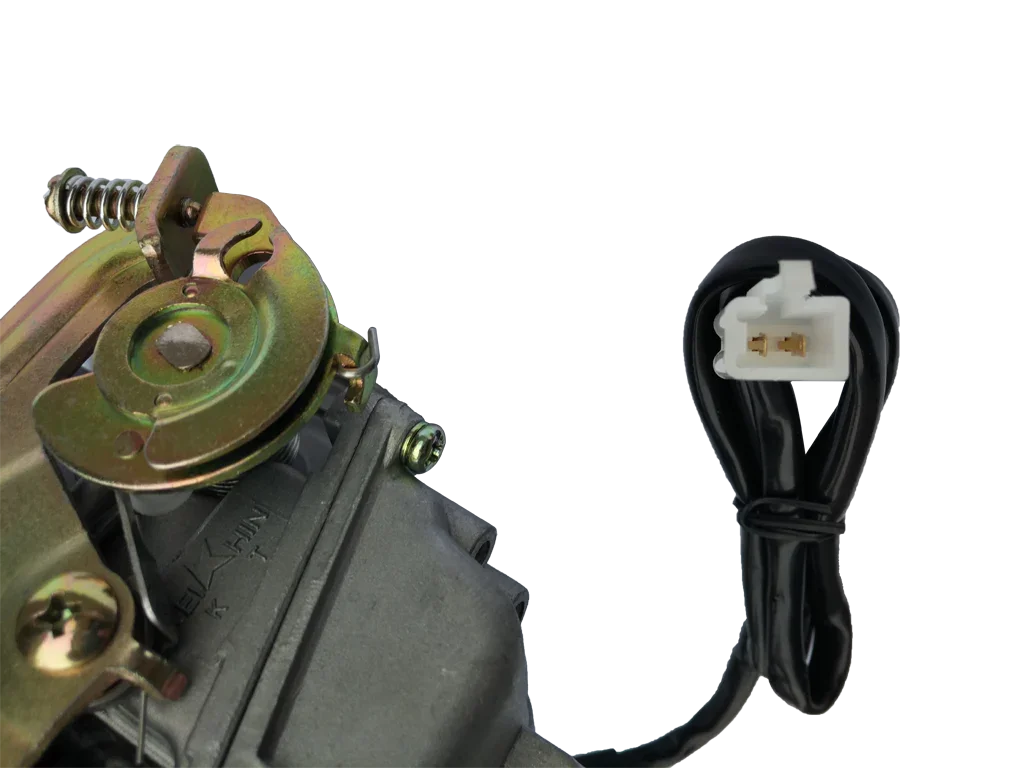 Motorcycle carburetor with throttle assembly and attached black electrical wire with white connector