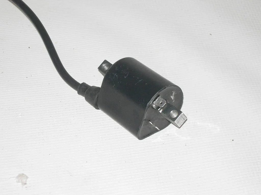 260 CC coil for small engines, shown in this image, with metal construction and wiring connections.