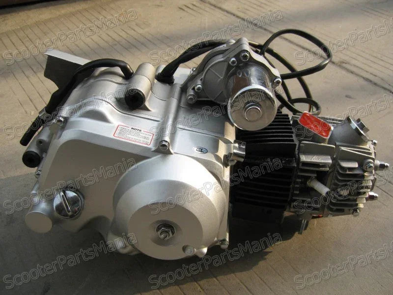 110cc auto gear engine for dirt bikes, showing a compact motor part designed for off-road motorcycle performance.