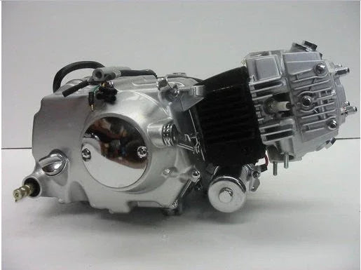 110cc dirt bike engine with semi-automatic transmission and reverse, suitable for off-road motorcycle repair or customization.