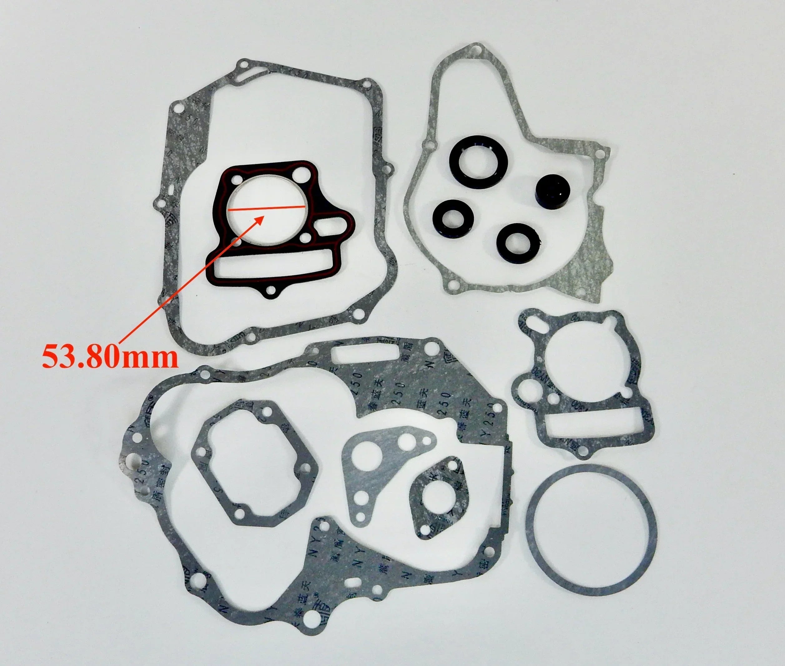 Horizontal 125cc engine gasket set for dirt bikes, includes gaskets and seals for engine repair and maintenance.