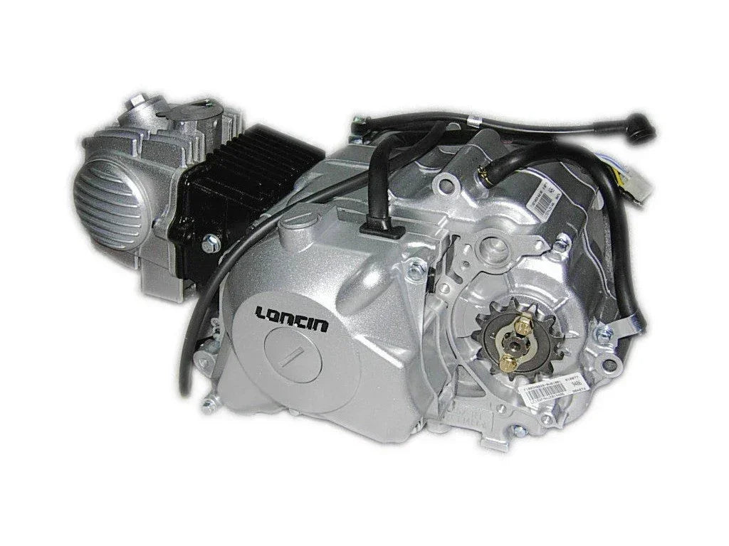 125cc Loncin dirt bike engine part, showing the compact engine with cooling fins and mounting points.