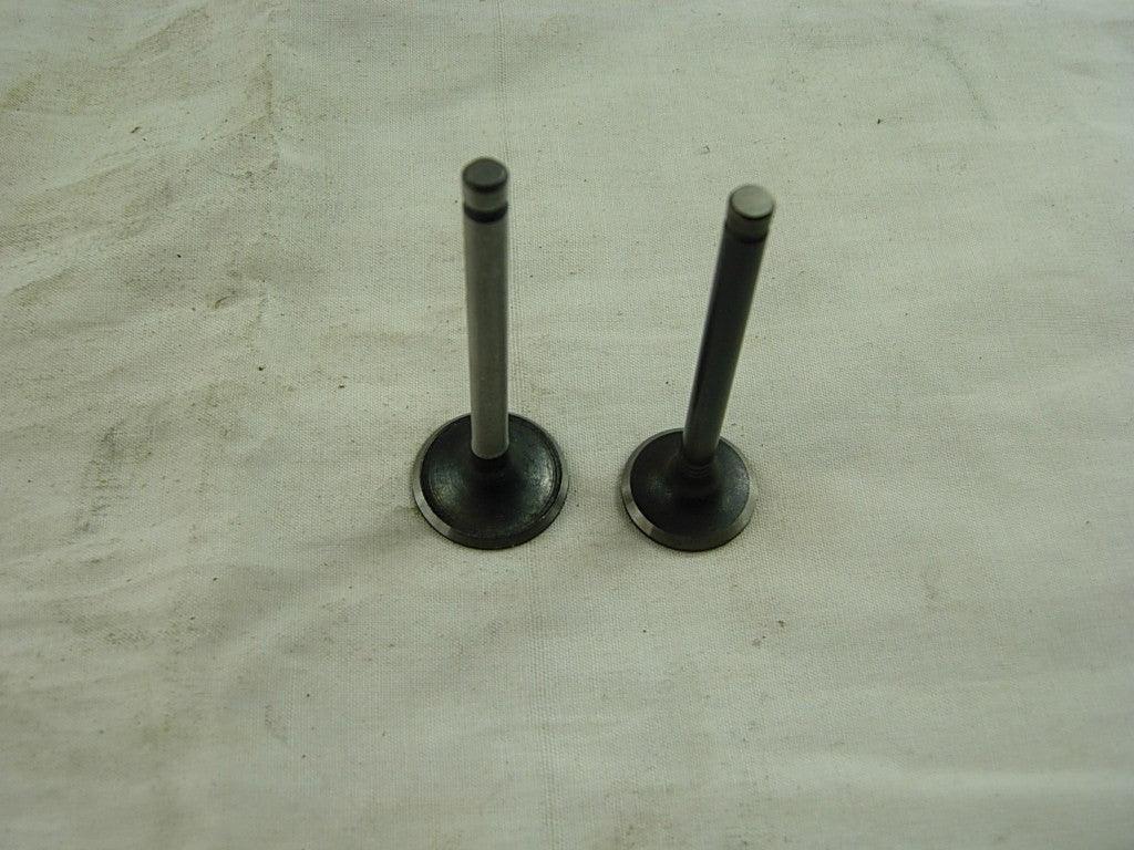 Horizontal style 125cc dirt bike intake and exhaust valve, durable metal components with precise fit for reliable performance.