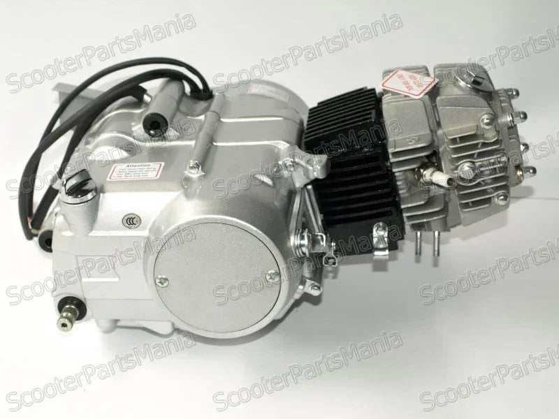 125cc Sanxing dirt bike engine, compact motorcycle engine part for off-road bikes, vendor-unknown brand, shown with engine components.