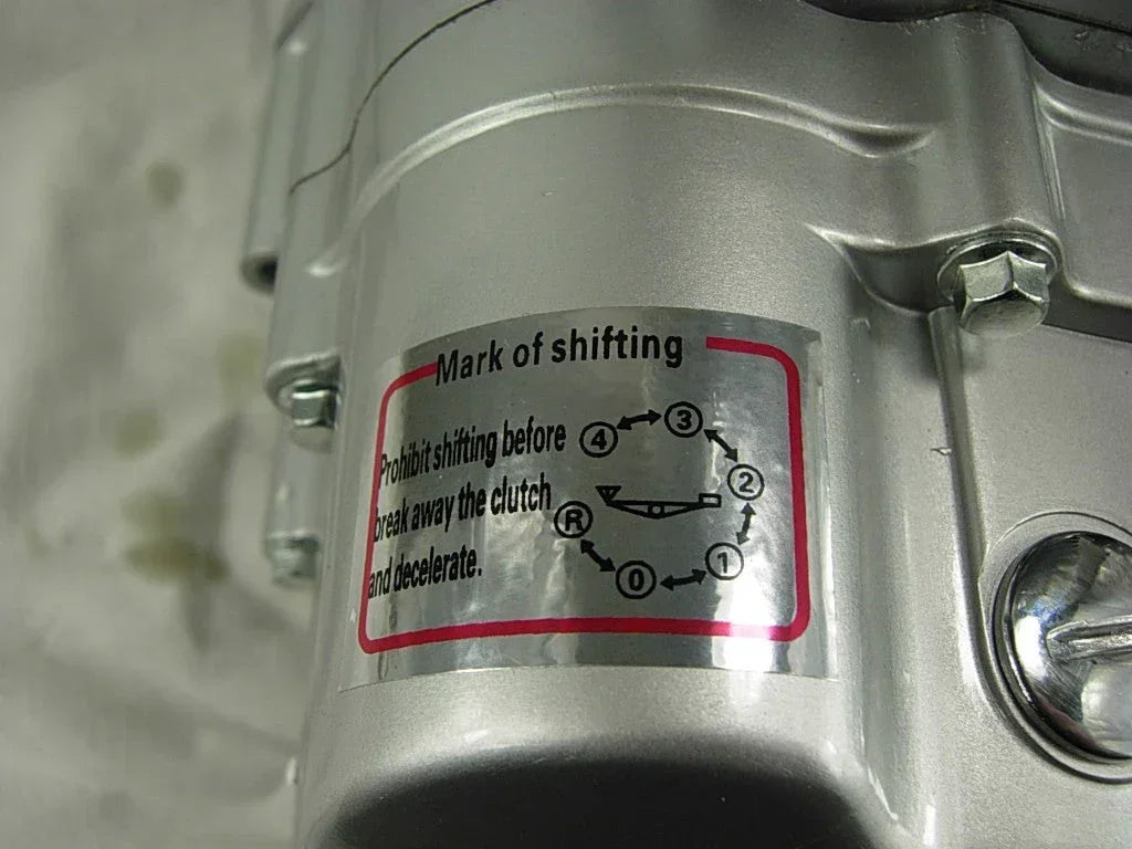 150cc 4-speed gear with reverse engine for dirt bikes, showing the metal gear mechanism and components.