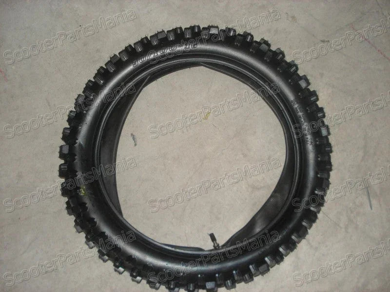 16-inch rear dirt bike tire with tube, size 1.60-16, designed for off-road riding and durable performance.