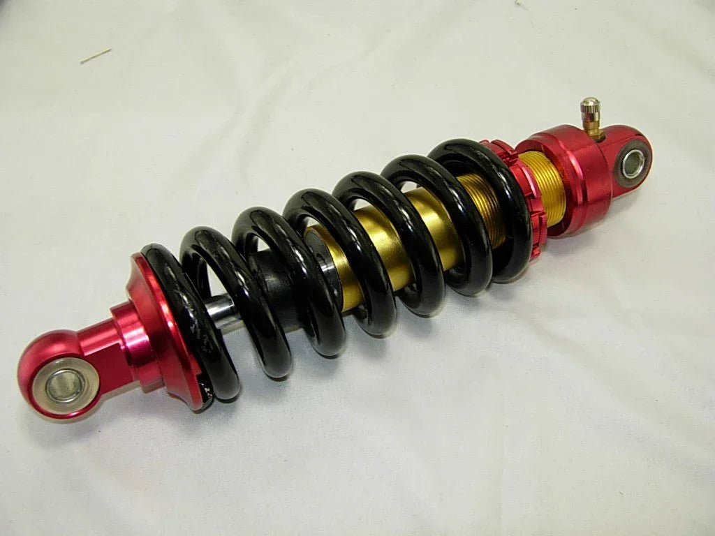26cm dirt bike rear shock absorber for off-road motorcycle, durable suspension part from vendor-unknown.