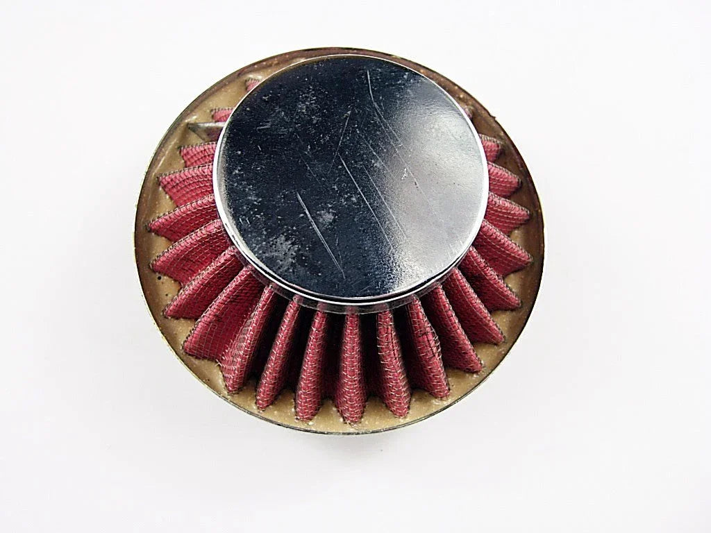 35mm air filter for dirt bikes, close-up of a round, high-performance motorcycle part with mesh and rubber frame.