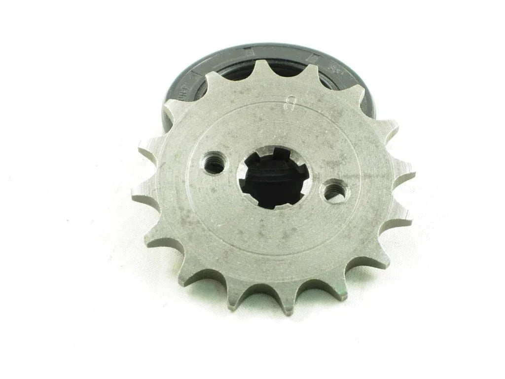 420 sprocket for 110cc and 125cc dirt bike engines, vendor-unknown dirt bike parts, metal sprocket with gear teeth.