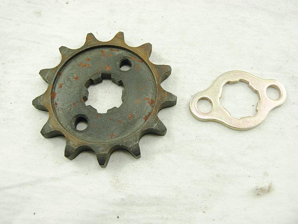 428 13-tooth engine sprocket for 50cc to 125cc dirt bikes, made of metal with gear teeth visible for engine power transfer.
