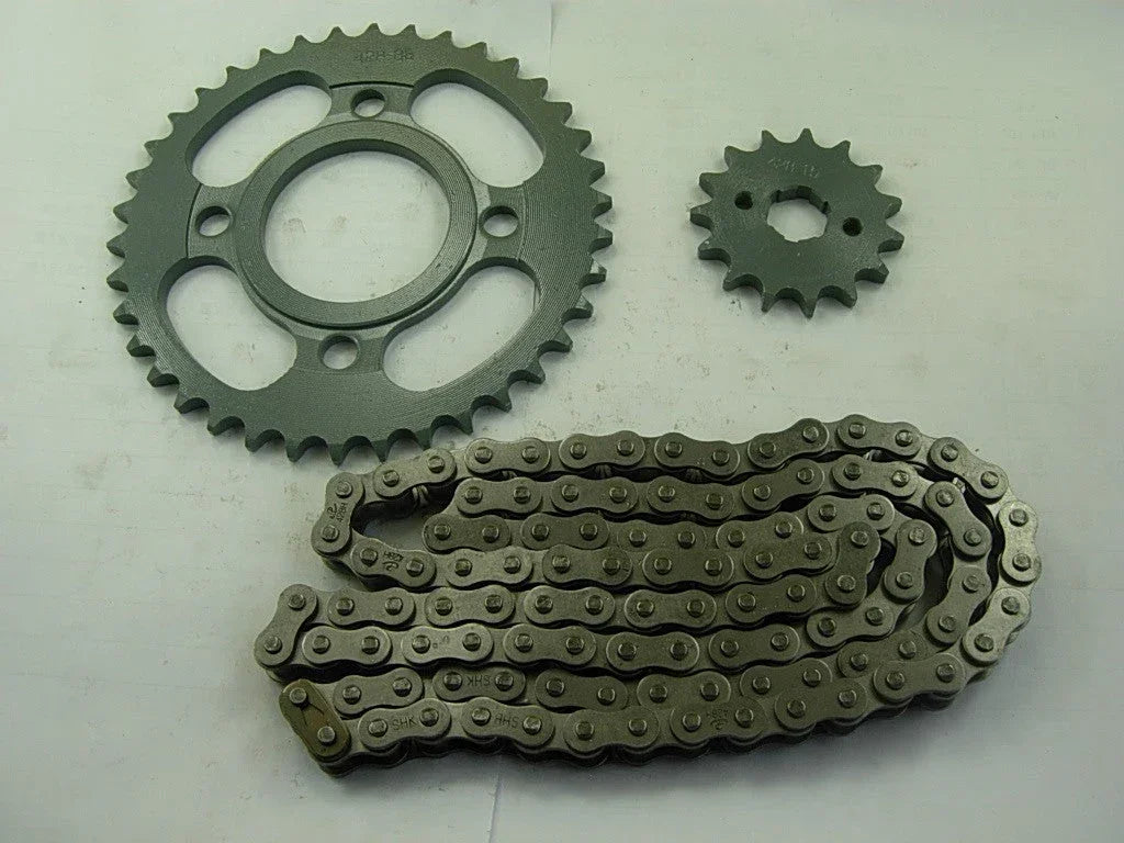 Dirt bike 428H sprocket chain with front and rear wheels, OEM-quality dirt bike parts for reliable performance.