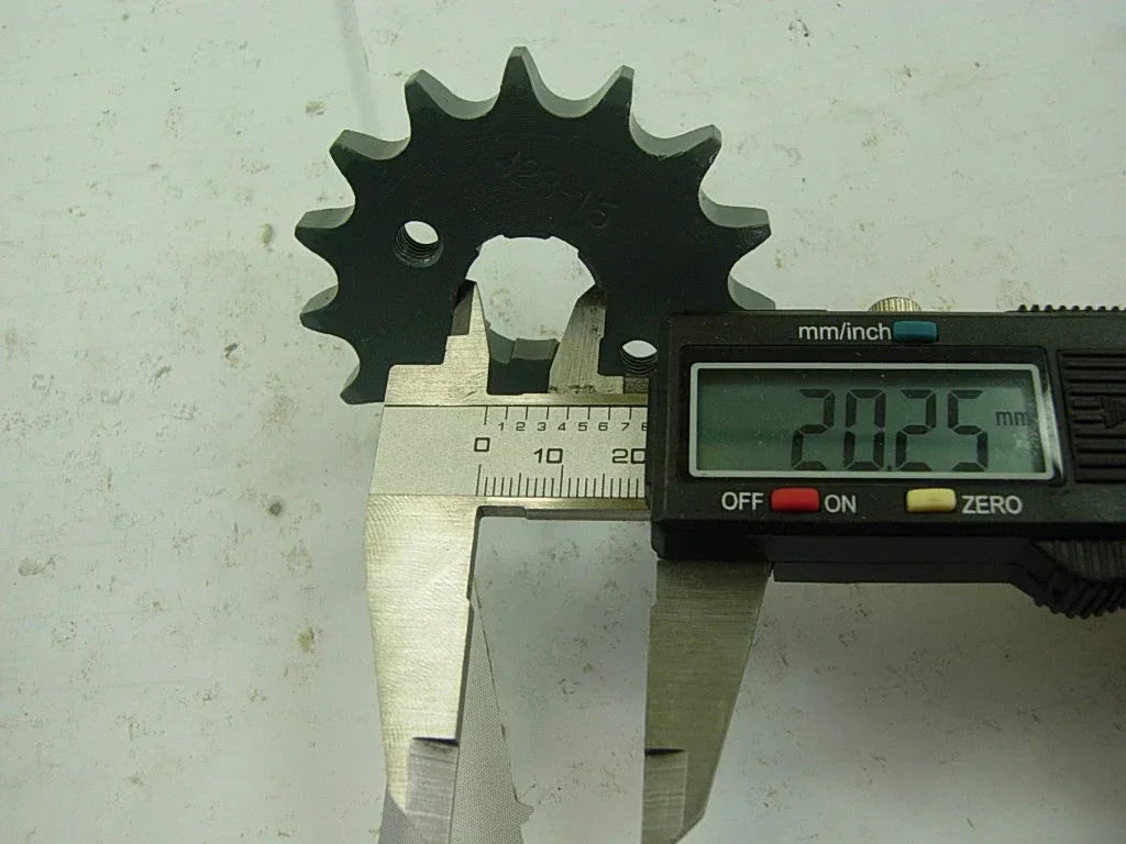 Dirt bike 428H sprocket chain with front and rear wheels, compatible with various off-road motorcycle models.