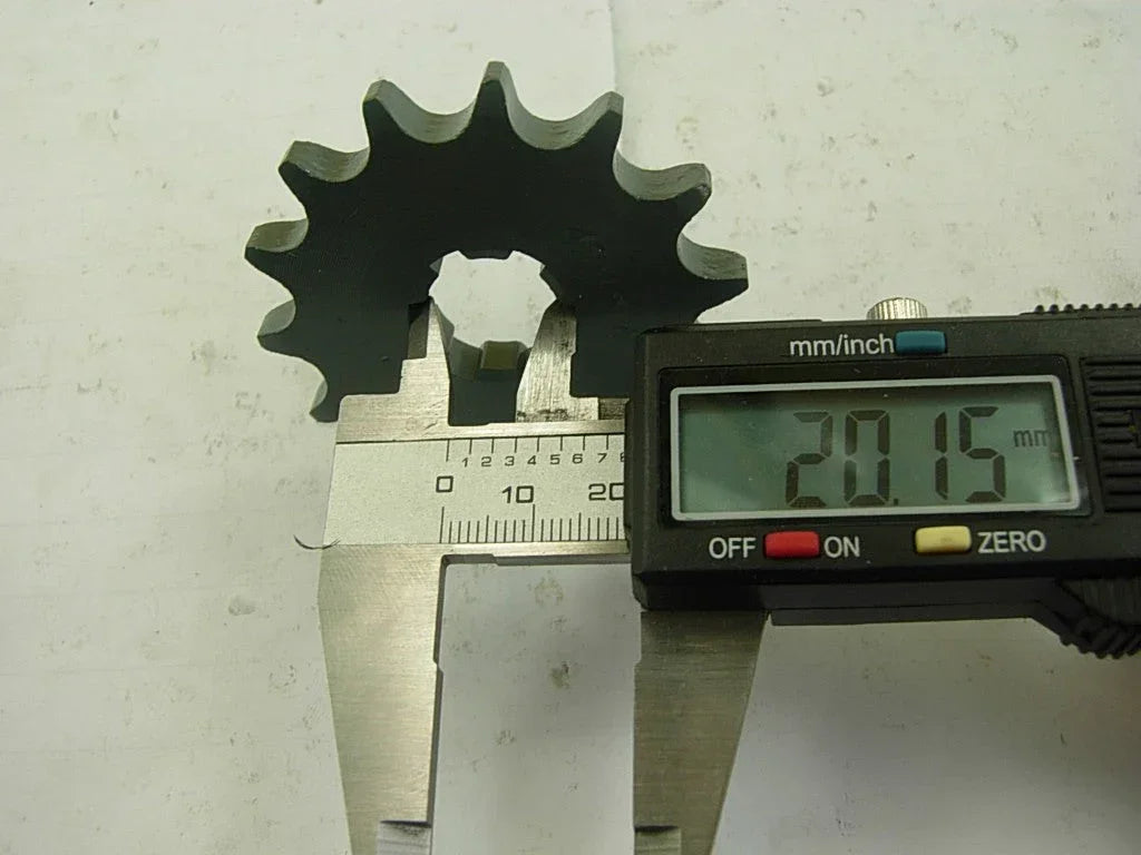 Dirt bike 428H sprocket chain with front and rear wheels, compatible for off-road motorcycle repairs.