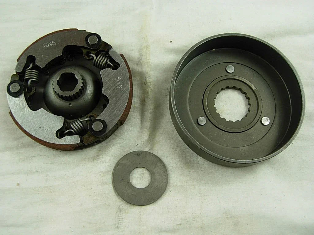 Automatic clutch for 50cc to 125cc dirt bike engines, compatible with various small engine dirt bike models.