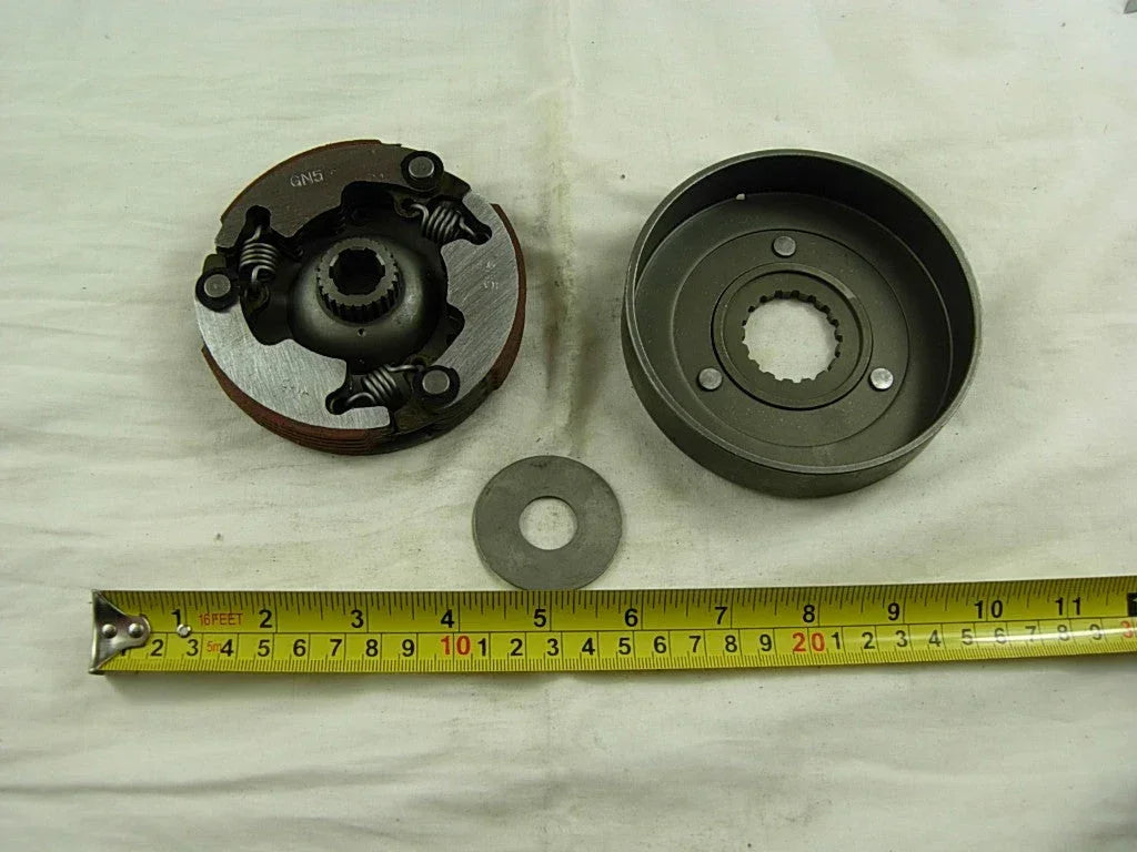 Automatic clutch for 50cc to 125cc dirt bike engines, compatible with various 70cc, 90cc, 110cc models, genuine dirt bike parts.