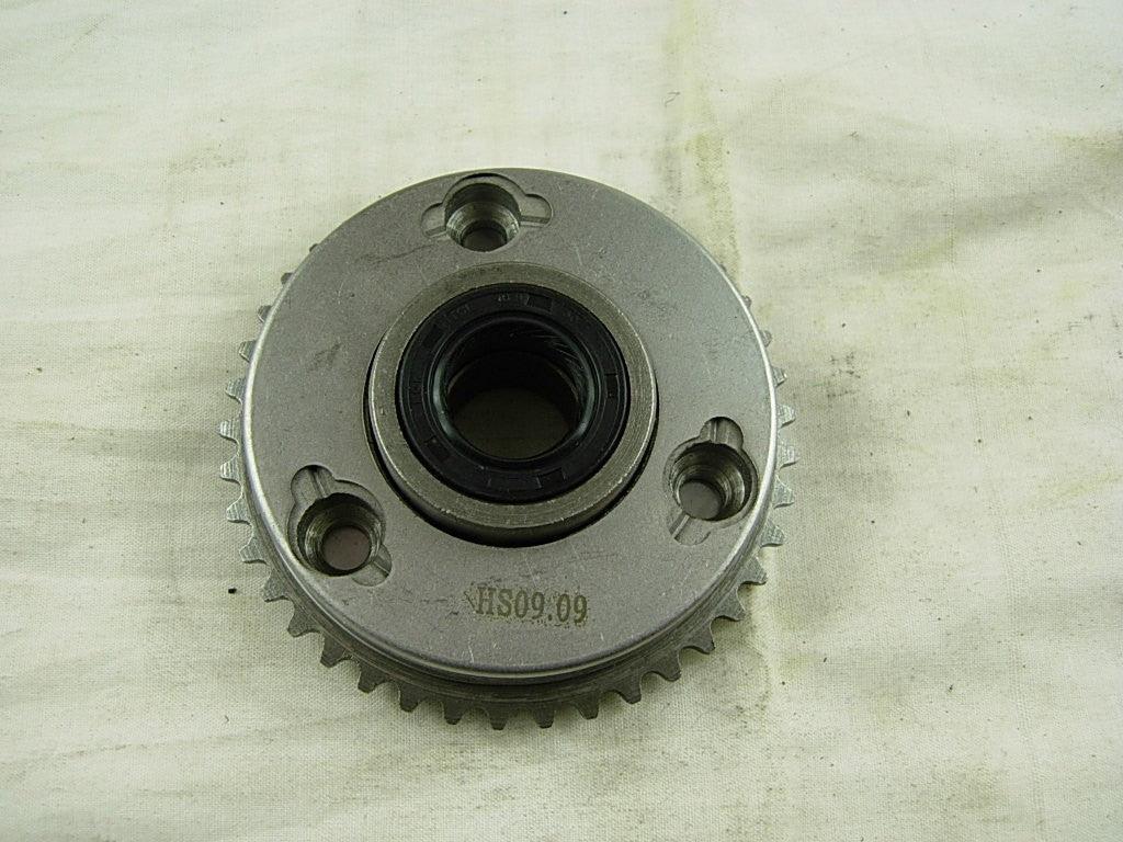Overrun starter drive clutch assembly for 50-125cc dirt bike engines, essential part for dirt bike clutch systems.